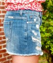 Cut-off destroyed denim skirt by Just USA.